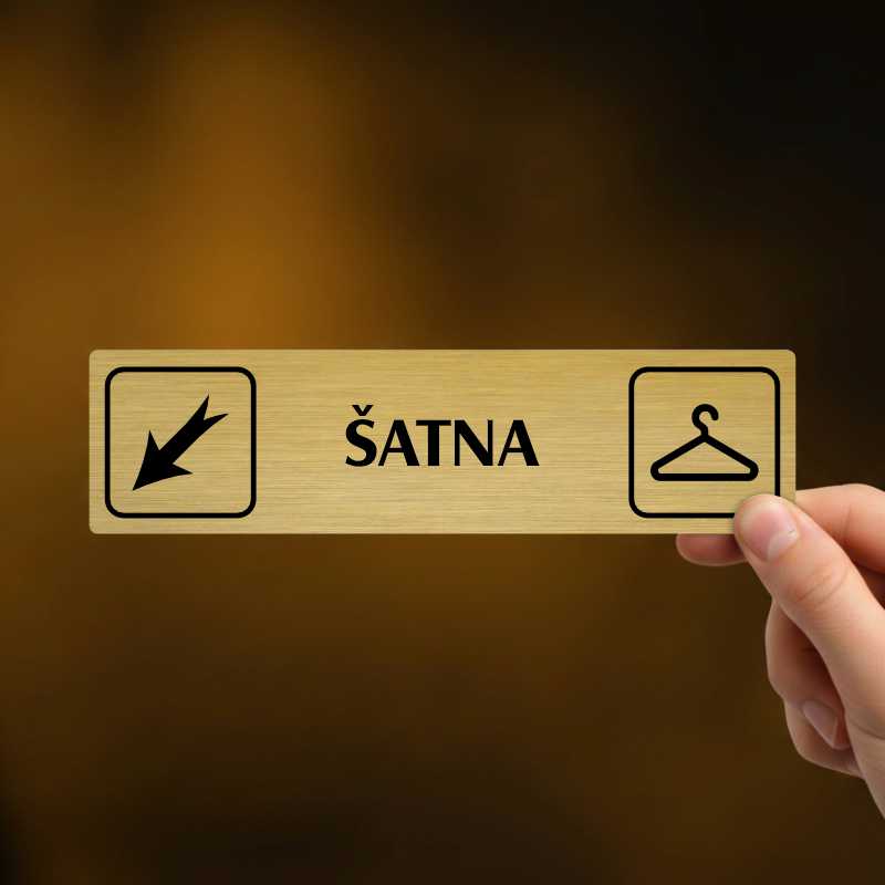 Šatna vlevo dolů, stříbrná cedulka, 180x45mm