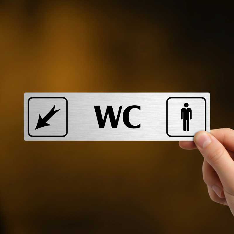 WC muži vlevo dolů, stříbrná cedulka, 180x45mm