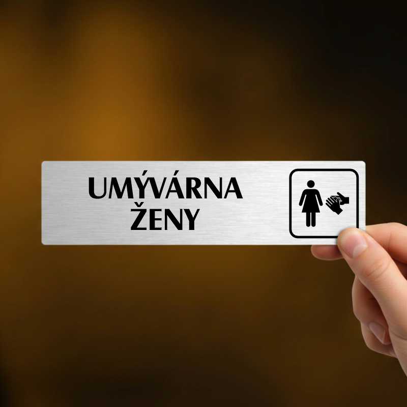 Umývárna ženy, stříbrná cedulka, 180x45mm