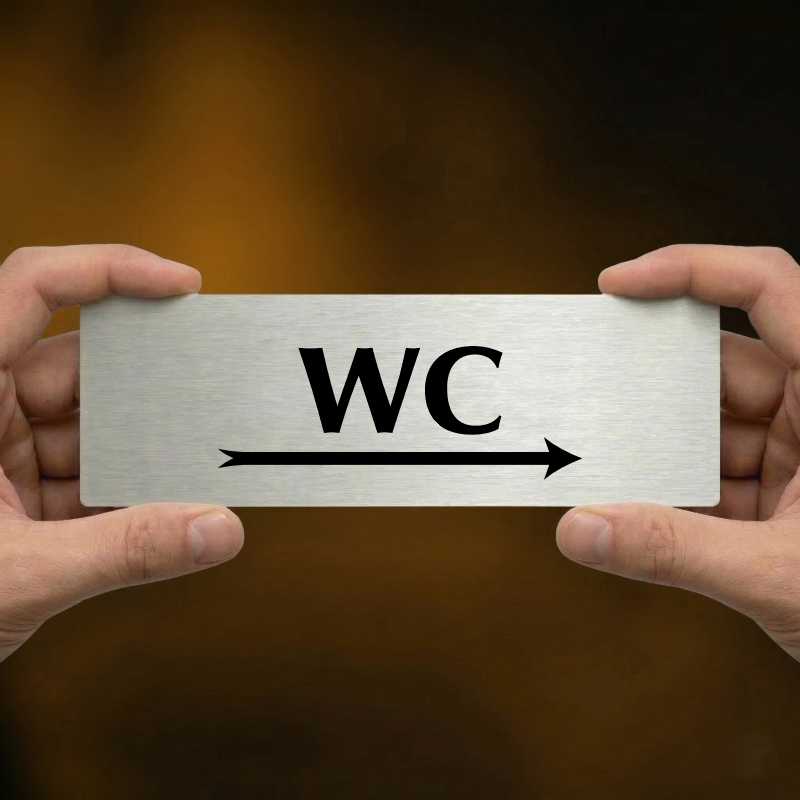 WC vpravo, 240x79mm, stříbrná popiska 