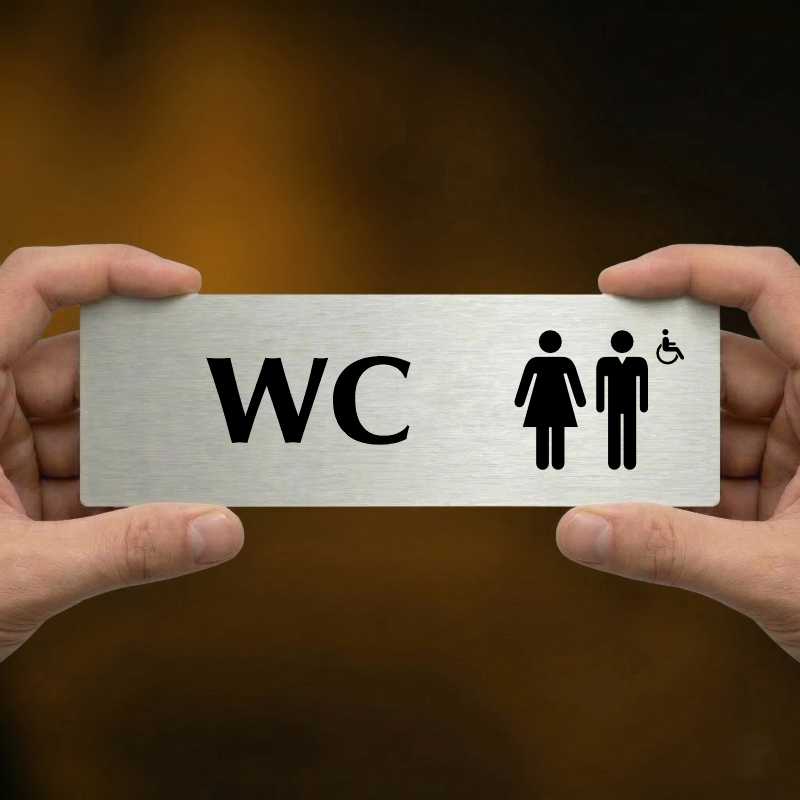 WC společné invalida, 200x66mm, stříbrná popiska s ozdobou uprostřed