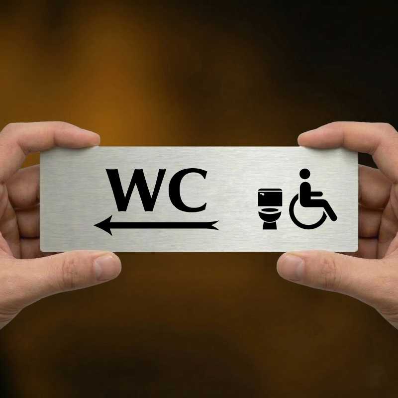 WC invalida vlevo, 240x79mm, stříbrná popiska s okrasným rámečkem  