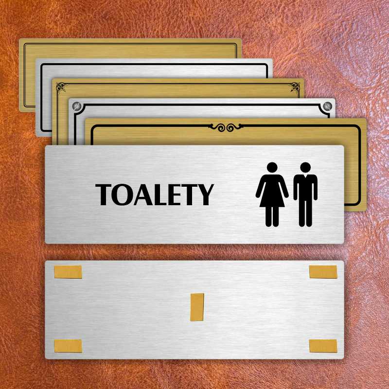 Toalety společné, stříbrná popiska na dveře