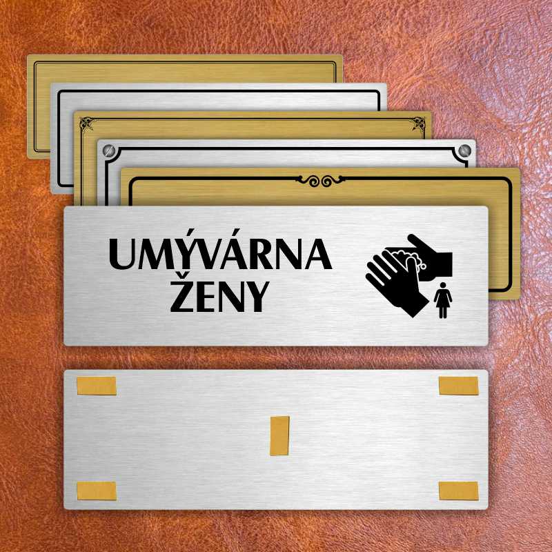 Umývárna ženy, 240x79mm, zlatá popiska s imitacemi šroubků