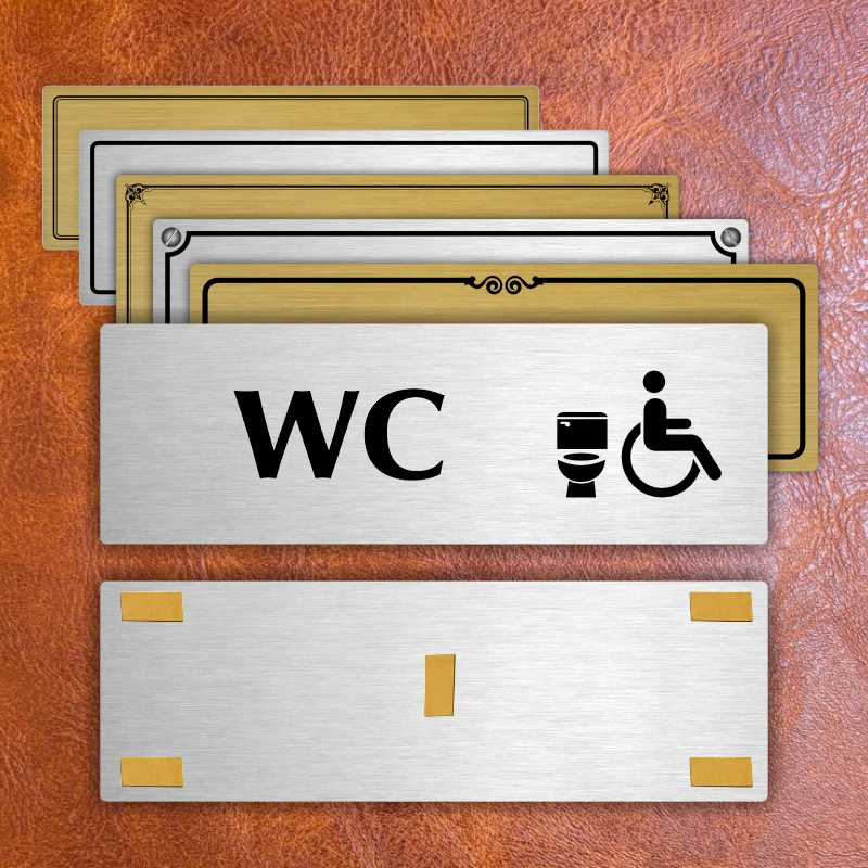 WC invalida, 200x66mm, zlatá popiska s ozdobou uprostřed