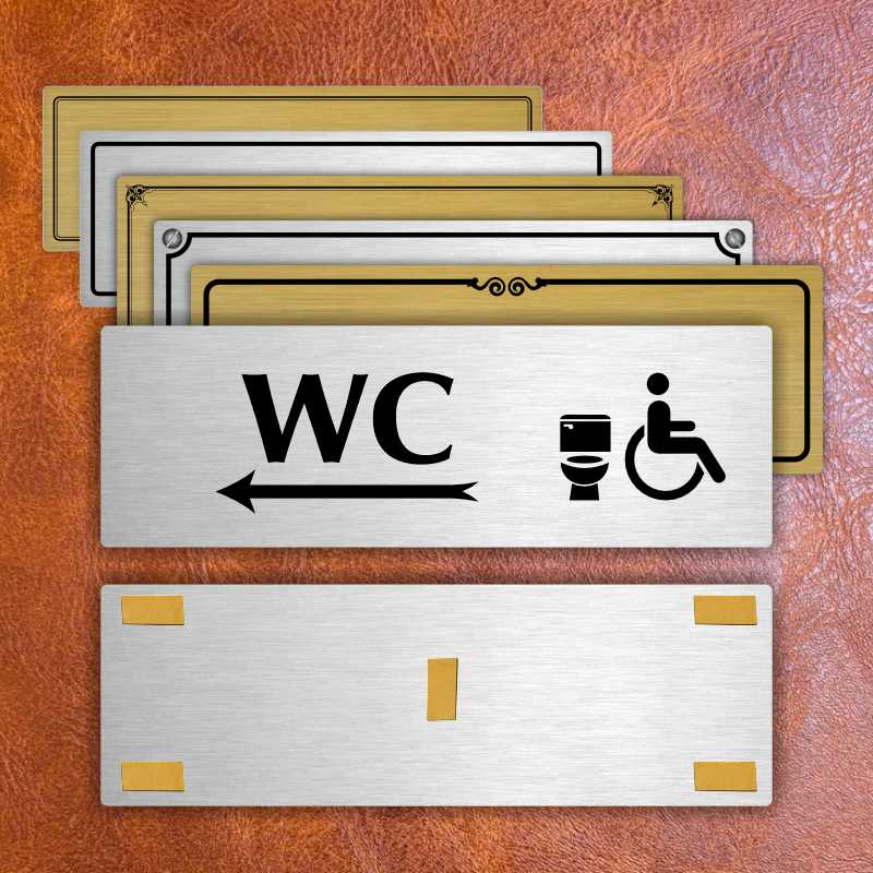 WC invalida vlevo, 240x79mm, stříbrná popiska s okrasným rámečkem  