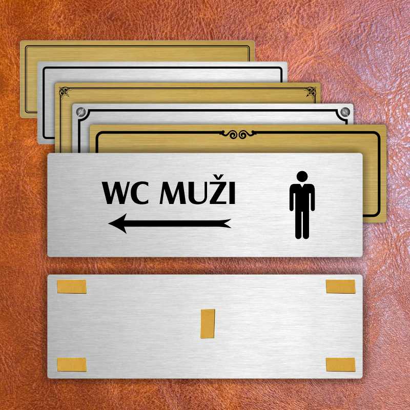 WC muži vlevo, 200x66mm, stříbrná popiska s ozdobou uprostřed