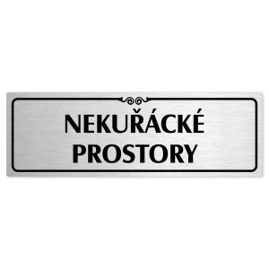 Nekuřácké prostory, 240x79mm, stříbrná popiska s ozdobou uprostřed