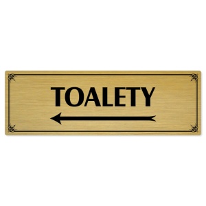 Toalety vlevo, 200x66mm, zlatá popiska s okrasným rámečkem  