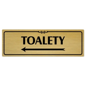 Toalety vlevo, 200x66mm, zlatá popiska s ozdobou uprostřed